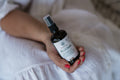 BLOOMIK 2in1 Body and Massage Oil — main product view on white background