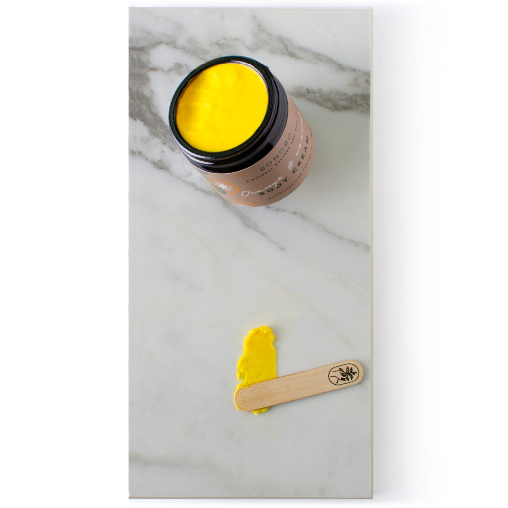 Orange & Carrot Body Cream / Nourishes & Protects — product packaging front detail
