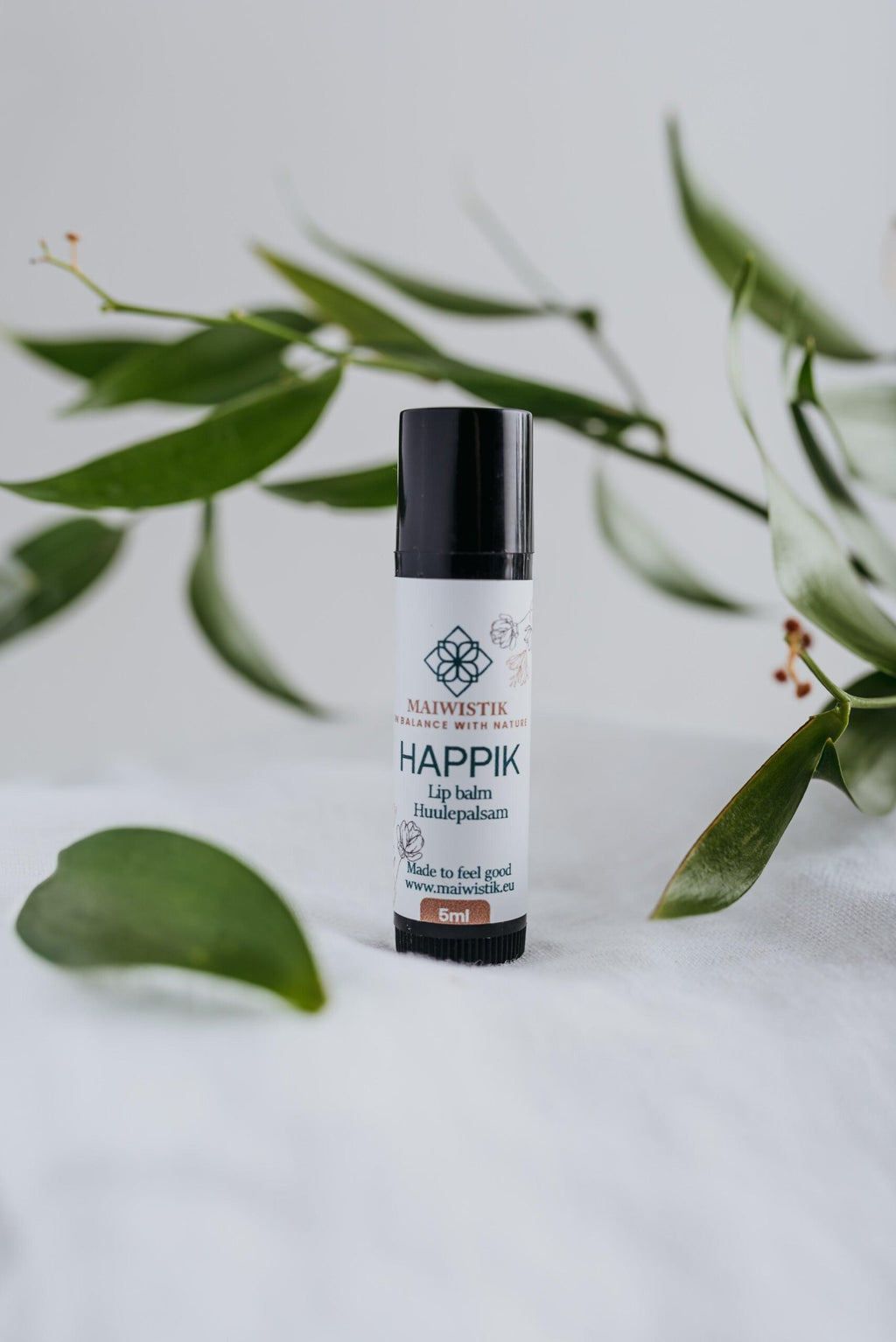 Happik Lip Balm — product packaging front detail