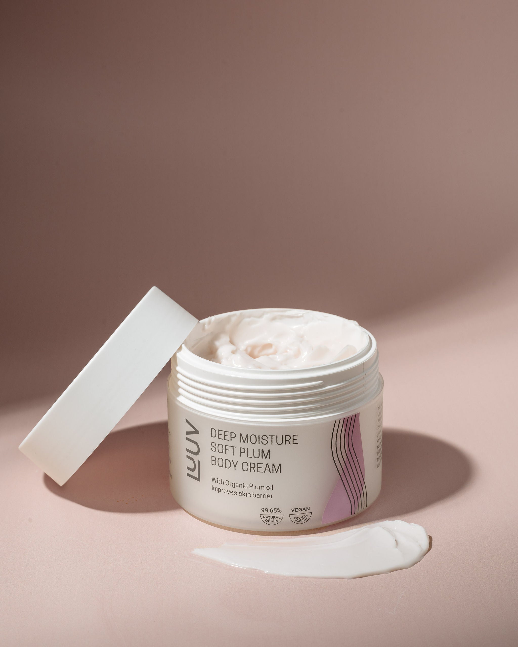 Natural Deeply Moisturizing Body Cream with Plum Oil — main product view on white background