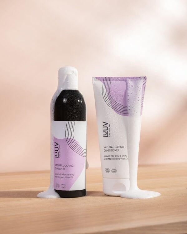 Natural Nourishing Conditioner with Plum Oil — product packaging front detail